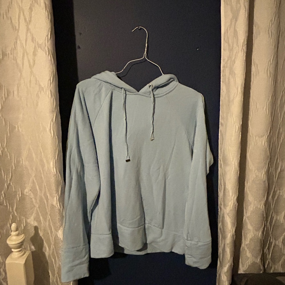 Danskin Sky Blue Hoodie, with a mesh stripe down the sleeves.